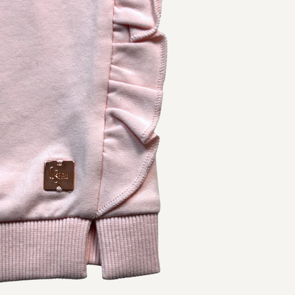 Volantes laterales y tejido rosa suave – Vestido bebé Carrement Beau

